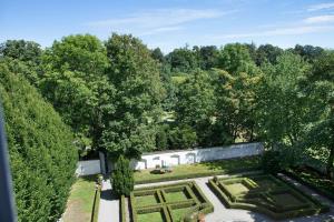 an aerial view of a garden with a hedge at Schloss Kirchberg - Schlossnest in Immenstaad am Bodensee