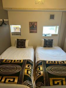 Postel nebo postele na pokoji v ubytování Higashi-Shinjuku 1002