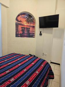 Μια τηλεόραση ή/και κέντρο ψυχαγωγίας στο Costa Bonita Beach & Resort