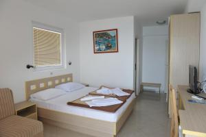 Cama o camas de una habitación en Hotel Obala