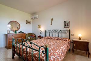 Katil atau katil-katil dalam bilik di Villa Pitti