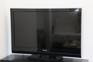 TV a/nebo společenská místnost v ubytování Comore Villa 1F + 26 fotografií