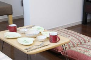 Postel nebo postele na pokoji v ubytování Comore Villa 1F