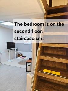 the room is on the second floor of a apartment at Namsan Nest in Seoul