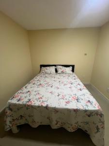 Ένα ή περισσότερα κρεβάτια σε δωμάτιο στο Ap COP30 Green