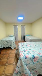 Ένα ή περισσότερα κρεβάτια σε δωμάτιο στο Ap COP30 Green +19 φωτογραφίες