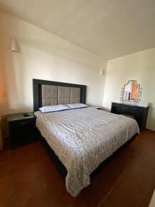 A bed or beds in a room at Casa Rinconsito Miramar