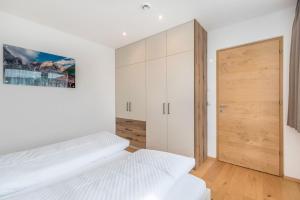 Postel nebo postele na pokoji v ubytování Residence Diana Apartment 401