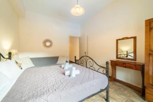 Una cama o camas en una habitación de Arianna Studio 15