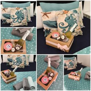 uma colagem de fotos com uma cama e uma garrafa de vinho em Hospedagem MAR SANTO em Florianópolis