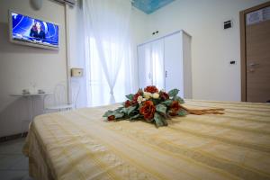 Postel nebo postele na pokoji v ubytování Hotel Caraibi