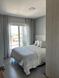 Postel nebo postele na pokoji v ubytování Departamento Chivilcoy