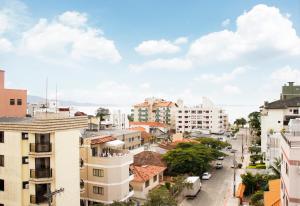 a view of a city street with buildings at Hotel Porto Madero in Florianópolis