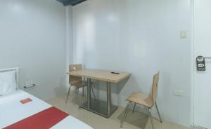 Fotografie z fotogalerie ubytování RedDoorz at Coral Tree Residences v destinaci Sampong