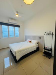 Ένα ή περισσότερα κρεβάτια σε δωμάτιο στο homestay Alor Setar near Aman Centre-Condo Menara View by HogarFeliz