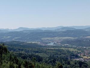 a view of a valley with a lake and mountains at Haus Frank in Wehr