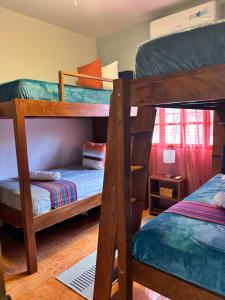 Postel nebo postele na pokoji v ubytování Artola Beach Rentals Advisors + 7 fotografií