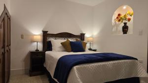 Ένα ή περισσότερα κρεβάτια σε δωμάτιο στο Casa Linda