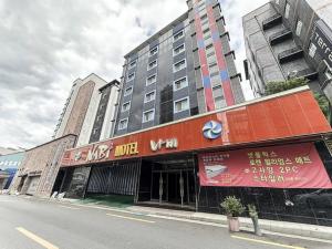 a building on the side of a city street at 전주 나비모텔 