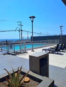 Bazén v ubytování Hermosa vista al mar II dpto Sector Sur Llacolen nebo v jeho okolí