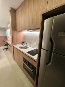 Kuchyň nebo kuchyňský kout v ubytování Sophisticated and Comfortable Studio - Vila Mariana