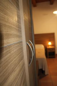 Postel nebo postele na pokoji v ubytování Agriturismo L'Ulivo