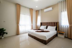 Ένα ή περισσότερα κρεβάτια σε δωμάτιο στο Wow Mountain Pool Villa Aonang +24 φωτογραφίες