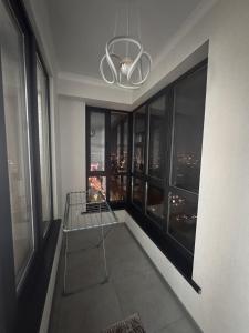 a room with a view of a city skyline at Элеганс в Континенталь in Bishkek