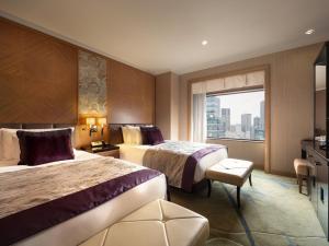 Una cama o camas en una habitación de Hotel Metropolitan Tokyo Ikebukuro