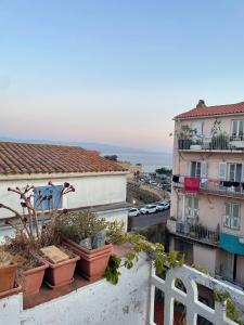 a view from the balcony of a building at Auberge du cheval blanc in Ajaccio