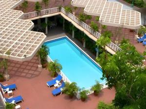 an overhead view of a swimming pool in a hotel at Hotel Ruposhi Bangla in Bāg Noādda