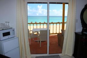 Kuchyň nebo kuchyňský kout v ubytování Rendezvous Bay Hotel