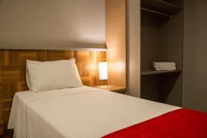 Postel nebo postele na pokoji v ubytování Amenit Hotel