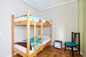 Posteľ alebo postele v izbe v ubytovaní Acà Y Allà Apartamento Alfonso El Batallador