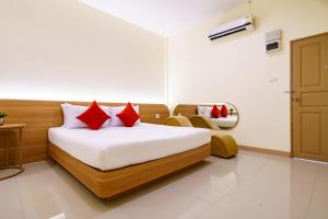 Postel nebo postele na pokoji v ubytování OK Resort Banchang