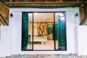 Φωτογραφία από το άλμπουμ του Bamboo Jungle Villa's σε El Nido