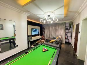 TV i/ili multimedijalni sistem u objektu Soothing Haven