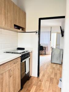 Kuchyň nebo kuchyňský kout v ubytování Apto estudio moderno tipo loft cerca a Unicentro