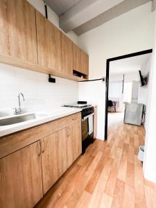 Kuchyň nebo kuchyňský kout v ubytování Apto estudio moderno tipo loft cerca a Unicentro + 5 fotografií