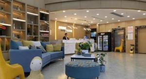 Posezení v ubytování VX Hotel Jiangsu Taizhou Xinghua RT-Mart