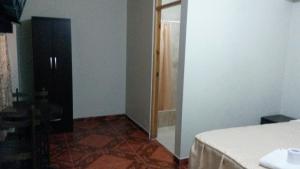 Letto o letti in una camera di Antares Inn