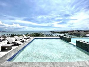 Πισίνα στο ή κοντά στο Apartamento the sand At the Point Cinta Costera Panamá +3 φωτογραφίες
