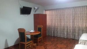 TV o dispositivi per l'intrattenimento presso Antares Inn
