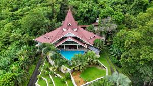 an aerial view of a house in the jungle at The Diamond Villa - Private Pool, Jacuzzi & Views in Pantai Cenang