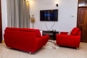 Μια τηλεόραση ή/και κέντρο ψυχαγωγίας στο Savannahs Kunduchi Villa