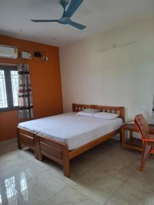 Postel nebo postele na pokoji v ubytování Roshni Apartment- 3rd Floor 3C + 6 fotografií