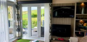 Et tv og/eller underholdning på E68 Durdle Door Holiday Park + 13 billeder