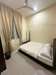 Ένα ή περισσότερα κρεβάτια σε δωμάτιο στο NHI Home Paka