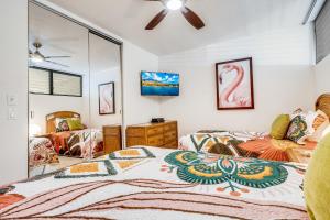 Postel nebo postele na pokoji v ubytování Papakea Resort Unit J303