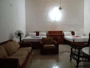 Postel nebo postele na pokoji v ubytování Sun Hinda Colombo